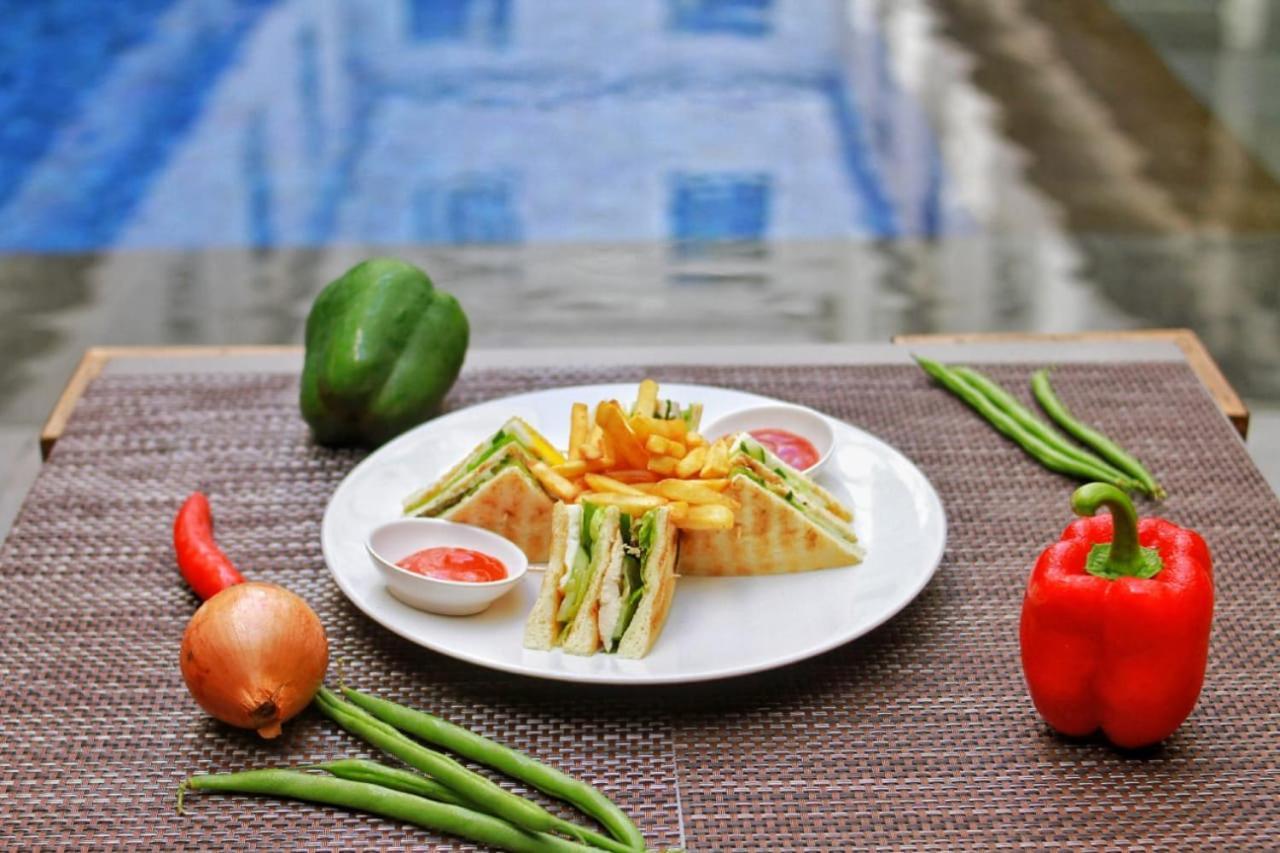 Hotel Swiss-Belexpress Kuta Legian Exterior foto